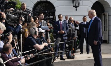 President Speaks to Reporters