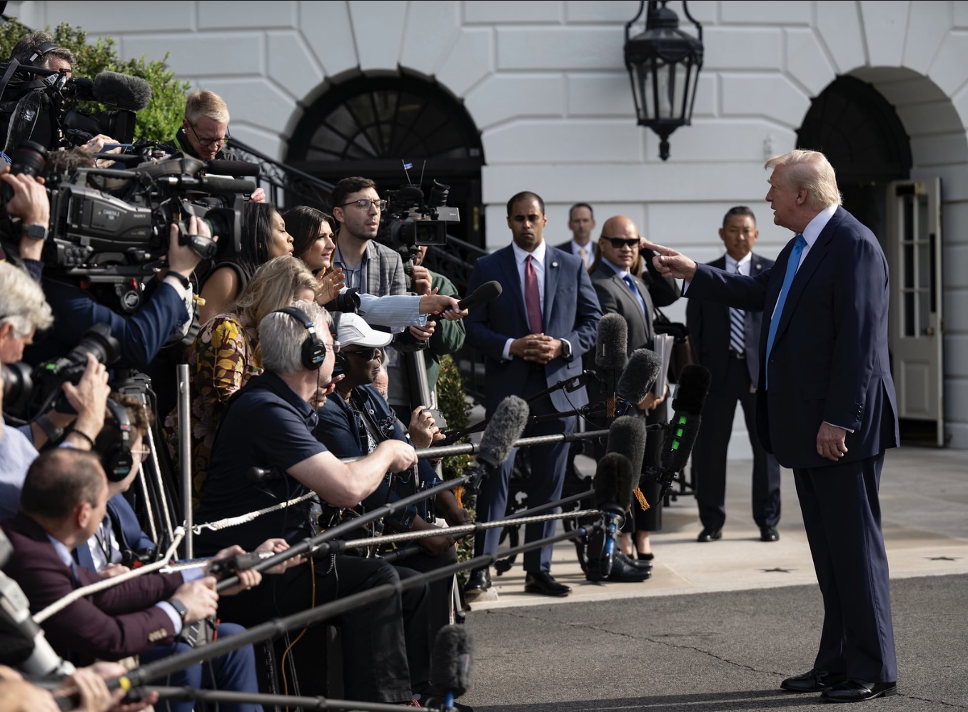 President Speaks to Reporters